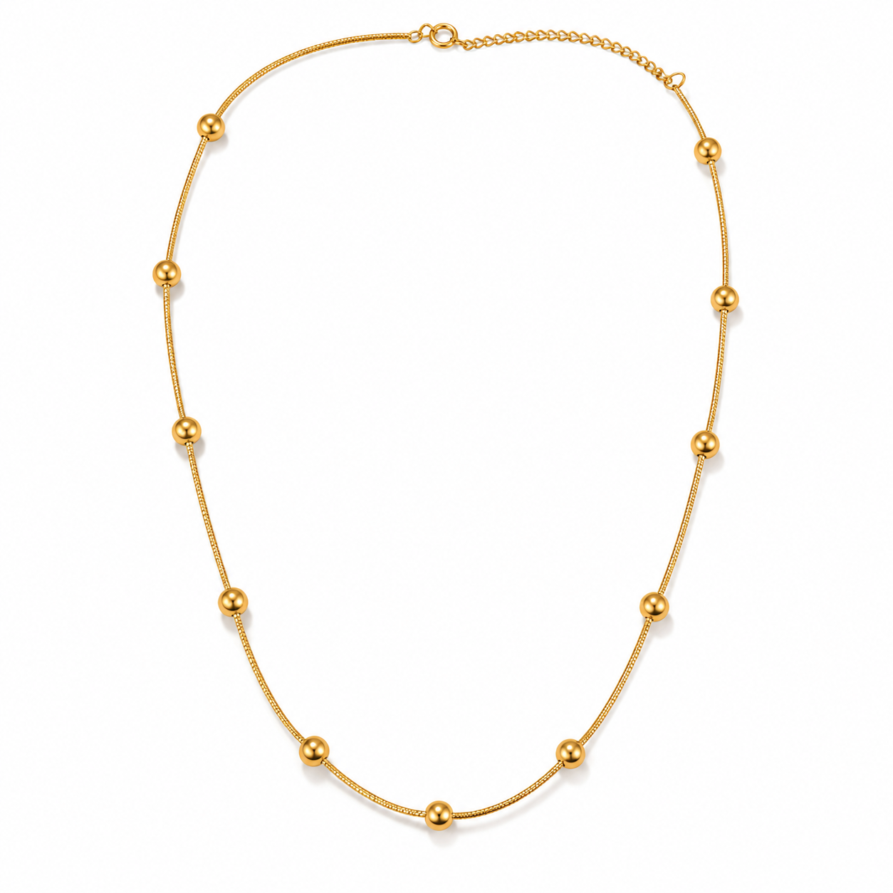 Gold beaded snake chain necklace on white background